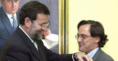 Mariano Rajoy con el director de La Razón